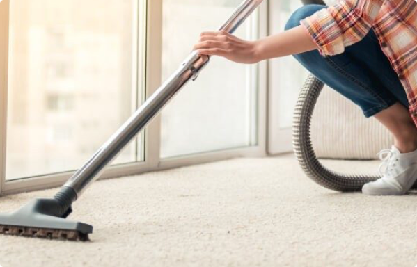 Lady cleaning carpet floor | Floor Systems