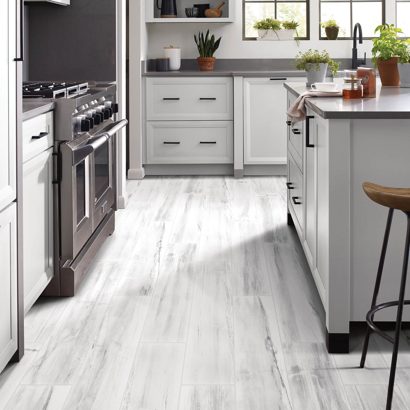 gray luxury vinyl plank flooring in kitchen | Floor Systems