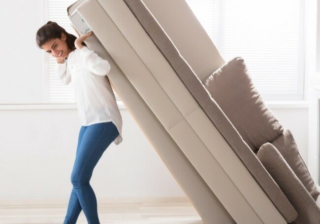 person moving couch | Floor Systems